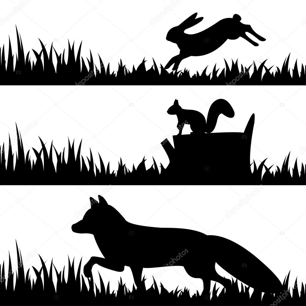 Set silhouettes of animals in the grass.