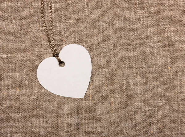 Heart shape label tag on sackcloth