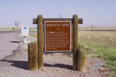 NEAR SOCORRO, NEW MEXICO, USA-OCT 6: A road side Historical Marker on U.S. Route 380, marks the area known as Trinity Site, location of the world's first atomic bomb detonation. Photographed in 2011. clipart