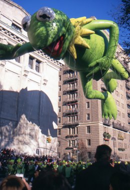NEW YORK-NOV 22: A holiday tradition since 1924, the annual Macy's Thanksgiving Day Parade is seen by more than 3.5 million people. Pictured here in 2012 is the Kermit the Frog balloon. clipart