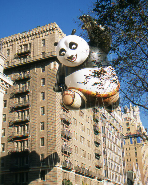 NEW YORK-NOV 22: A holiday tradition since 1924, the annual Macy's Thanksgiving Day Parade is seen by more than 3.5 million people. Pictured here in 2012 is the Kung Fu Panda balloon.