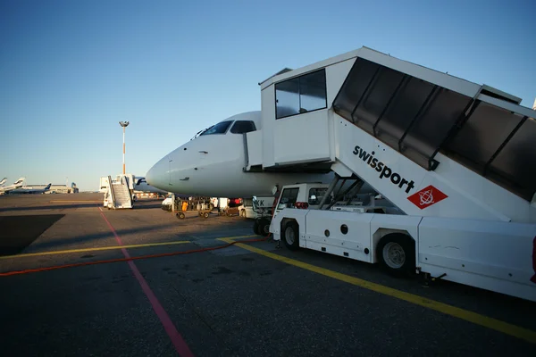 Airplane on airport — Stock Photo, Image