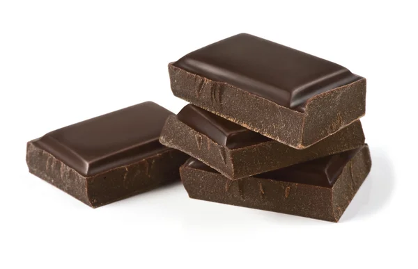 Piezas de chocolate aisladas en blanco —  Fotos de Stock