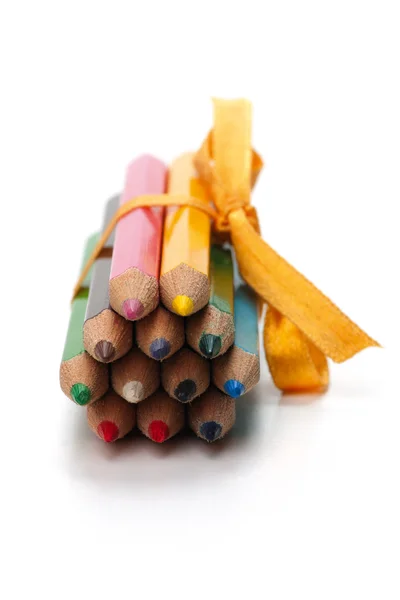 Pencils bound together with ribbon — Stock Photo, Image