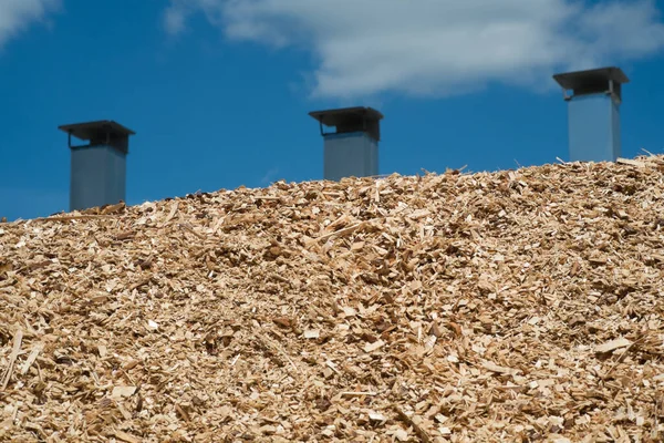 Pile Wood Chips Blue Sky Chimney Background Solid Fuel Stoves — Stock Fotó
