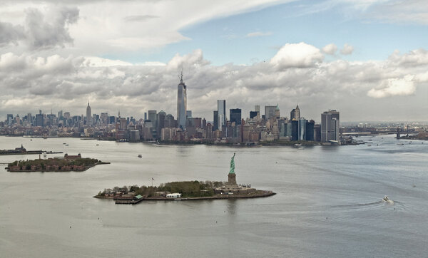 Manhattan bay and Liberty Island from a helicopter view, New York, USA