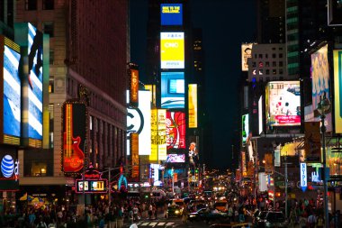 Crowds at Times Square urban night scene clipart