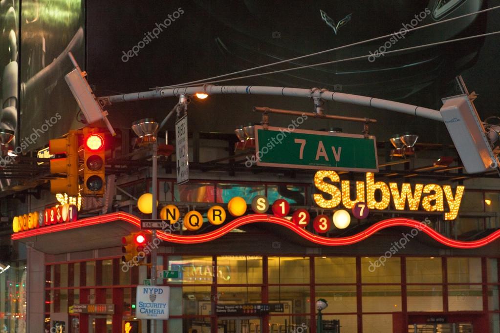 Times Square subway entrance at night Stock Editorial Photo