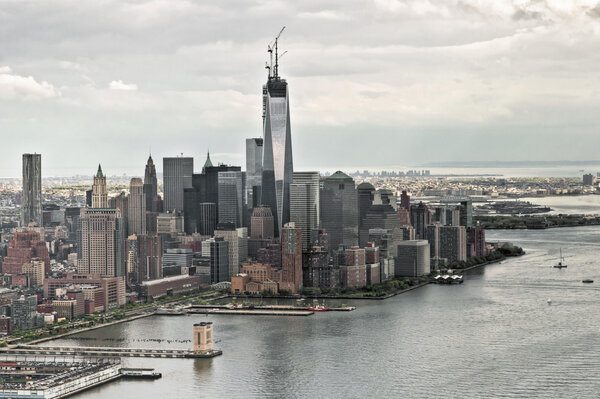 Manhattan bay from a helicopter, New York, USA. The building One World Trade Center under construction in Ground Zero Zone.