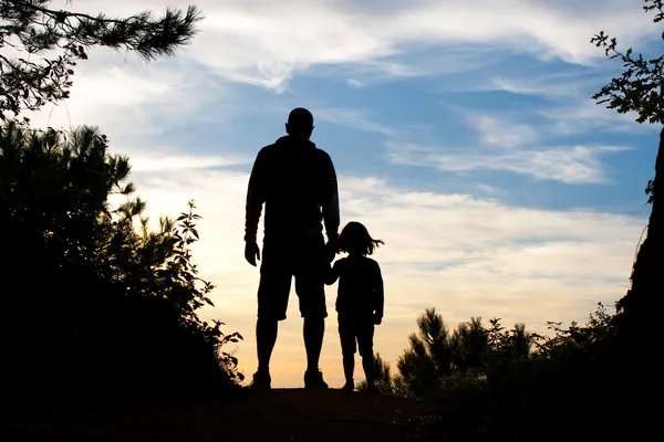 Padre e figlia silhouette Foto Stock