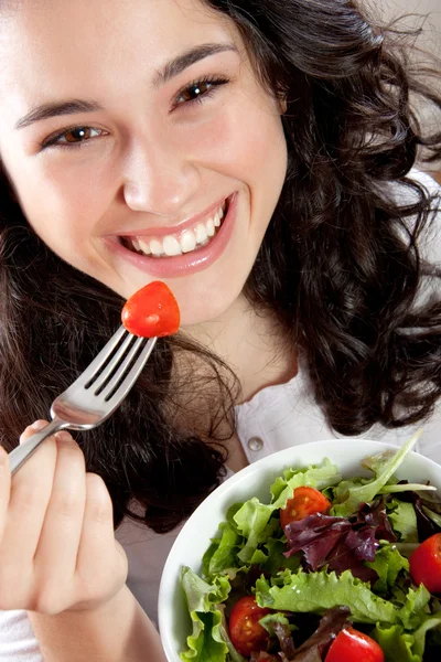 Happy woman eating salad — Stock Photo, Image