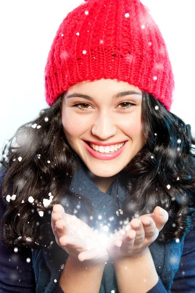 Christmas girl with snow in hands — Stock Photo, Image