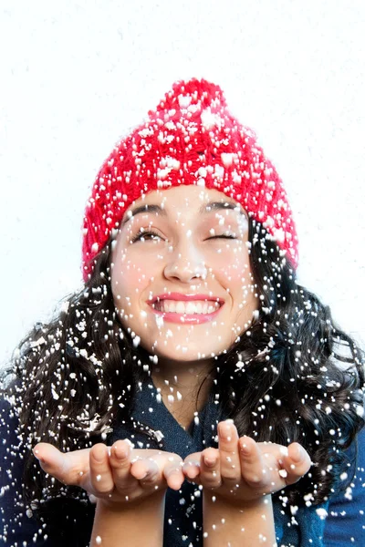 Snowfall over the girl Stock Image