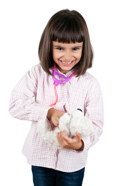 Pequeña niña feliz jugando doctor — Foto de Stock