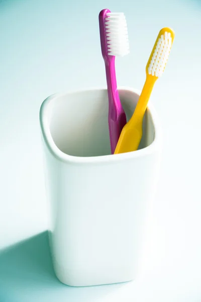 Toothbrushes in a mug — Stock Photo, Image