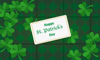 Aziz Patrick Günü tebrik kartı yeşil kağıtlı eşkenar dörtgen arkaplanındaki karanfili kes