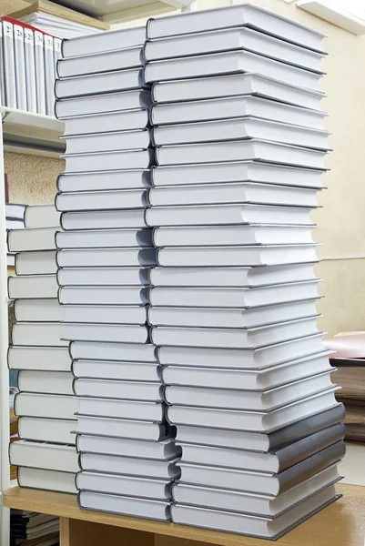 Tall stacks of thick books — Stock Photo, Image