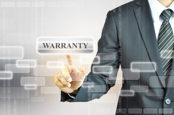 Businessman touching WARRANTY sign