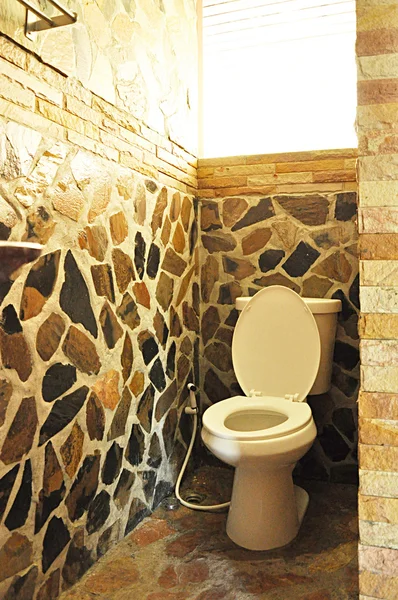 Stone wall toilet — Stock Photo, Image