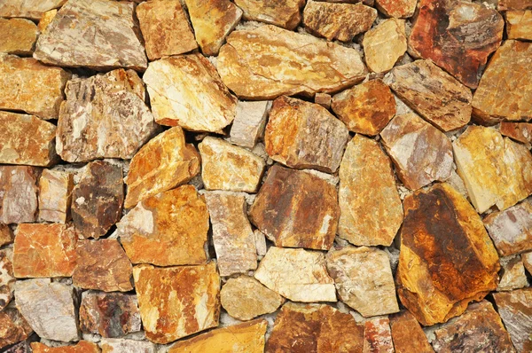 Kamienna ściana jako tło — Zdjęcie stockowe