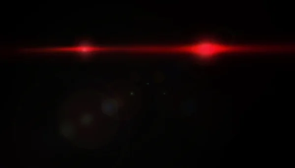 Holofotes vermelhos no fundo escuro com efeito de flare da lente — Fotografia de Stock