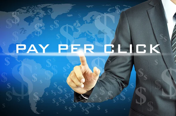 Businessman touching PAY PER CLICK on virtual screen — Stock Photo, Image