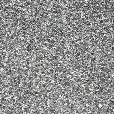 ezilmiş olan çakıl ile asfalt