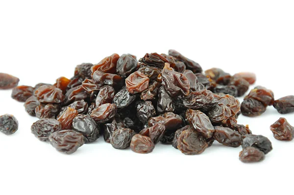 Heap of dark raisins on white background — Stock Photo, Image