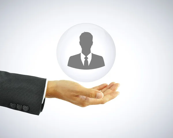 Hand holding businessman icon - HR concept — Stock Photo, Image