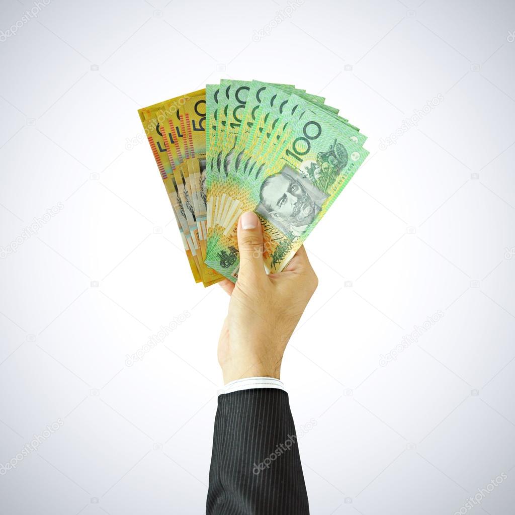 Hand giving money - AUD - Australian Dollars