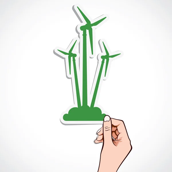 Moinho de vento verde adesivo na mão — Vetor de Stock