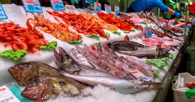 Fish market. Ice stall with fresh mediterranean seafood and fish.