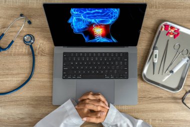 Top view of Doctor looking a x-ray of pain in the neck. Migraine Headache and backache. . High quality photo