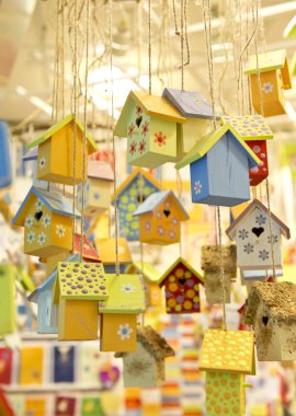 many wooden birdhouses clipart