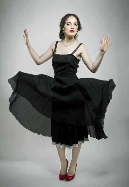 Retro woman with black dress — Stock Photo, Image