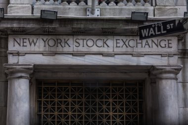 Wall Street sign in lower Manhattan New York clipart