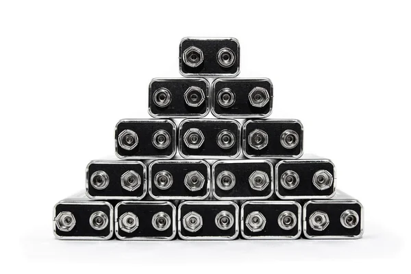 Nove baterias de volt formando uma pirâmide — Fotografia de Stock
