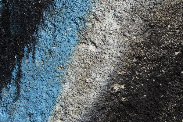 Graffiti detail op een korrelig betonnen wand — Stockfoto