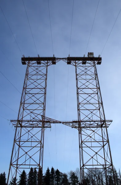 Big double electricity pylon in the forest — Stock Photo, Image