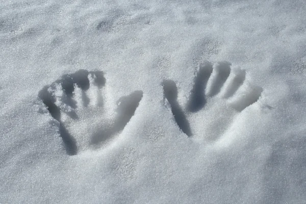 Handafdrukken in de sneeuw — Stockfoto