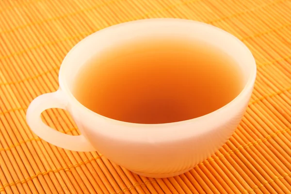 Cup of tea in warm golden light — Stock Photo, Image