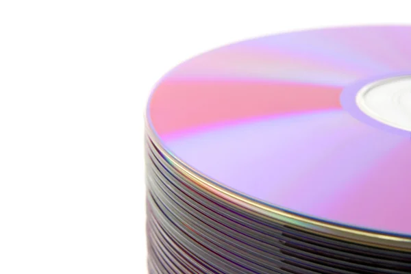 Close-up of stacked purple DVDs — Stock Photo, Image