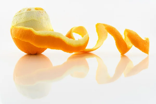 Orange with peeled skin — Stock Photo, Image