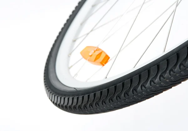 Rueda de bicicleta con reflector naranja —  Fotos de Stock