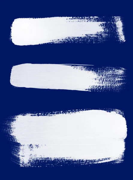 White brush strokes on blue background — Stock Photo, Image