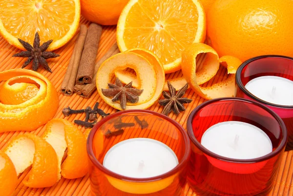 Candles, oranges and spices — Stock Photo, Image