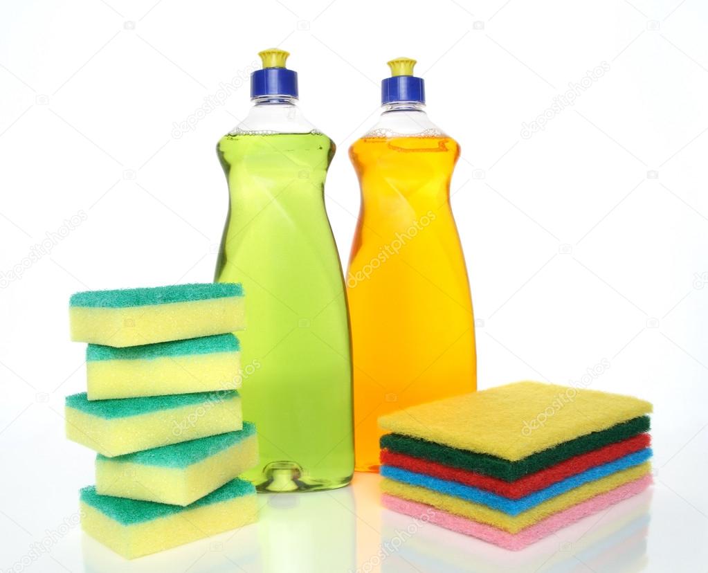 Bottles of dishwashing liquid and sponges