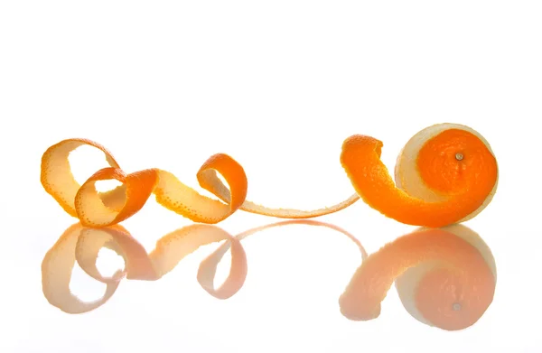 Orange with peeled spiral skin — Stock Photo, Image