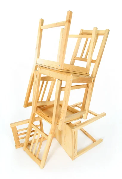 Gestapelde houten stoelen — Stockfoto