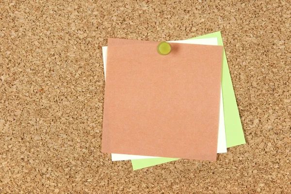 Colorful post-it notes pinned to corkboard — Stock Photo, Image